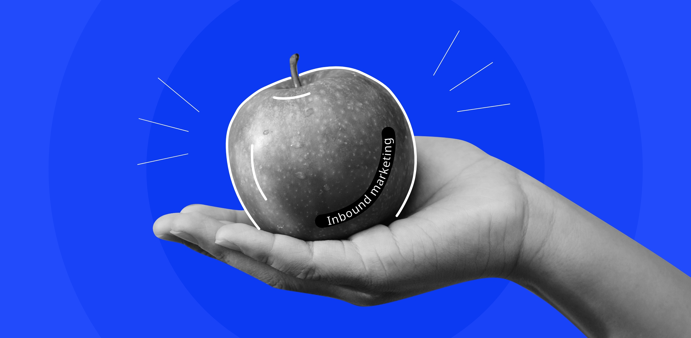 A palm holding an apple with inscription Inbound Marketing